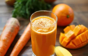 Przepis na smoothie pomarańczowo-mango-marchewkowe.